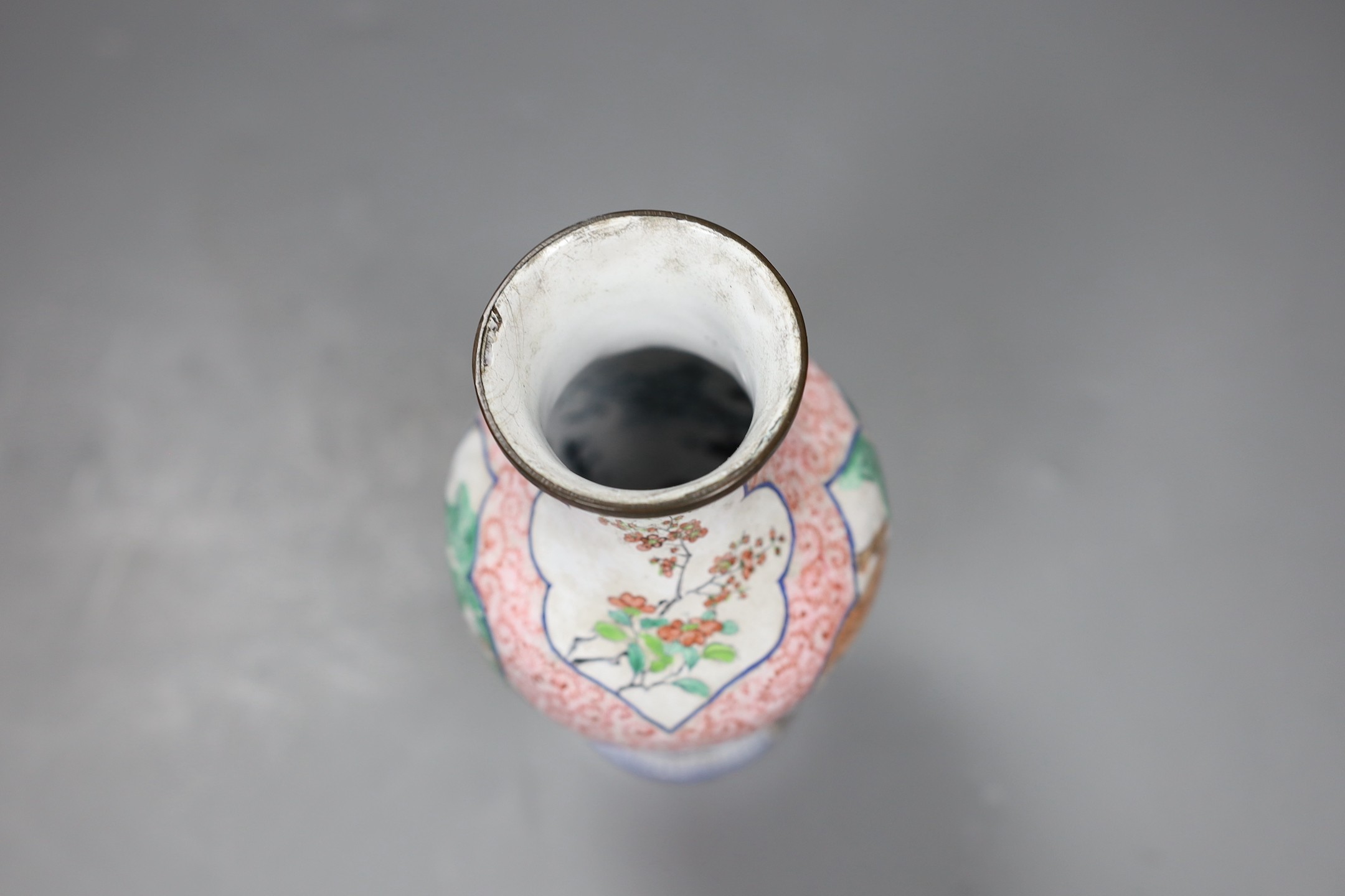 A Chinese Guangzhou enamel vase, Qianlong mark, late 18th / 19th century, 16.5cm tall